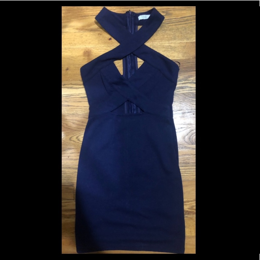 Purple form fitting, peekaboo mini dress! 💁‍♀️